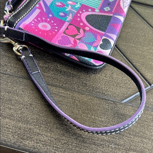 Dooney & Bourke x Disney Parks It's a small world collab wristlet bag authentic - Picture 4 of 12